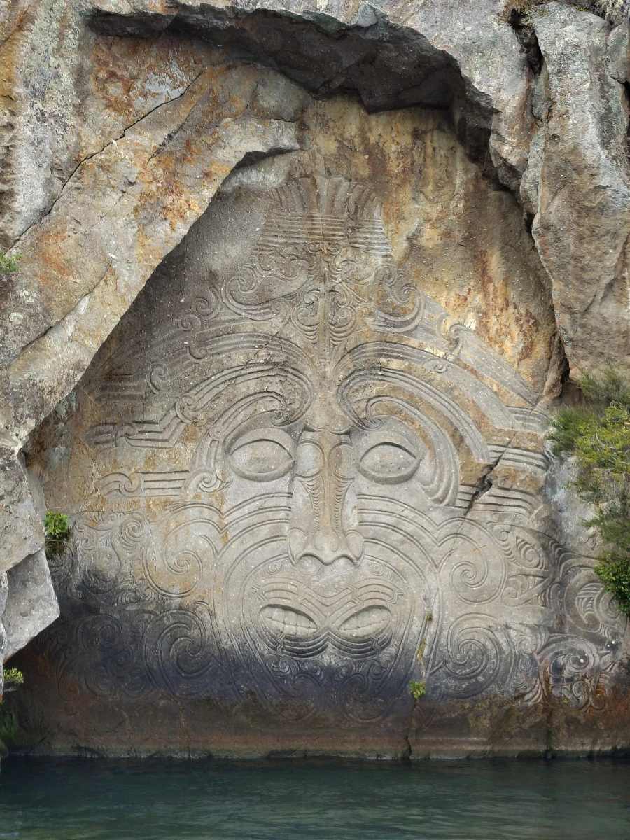 Maori Carvings on a cliff