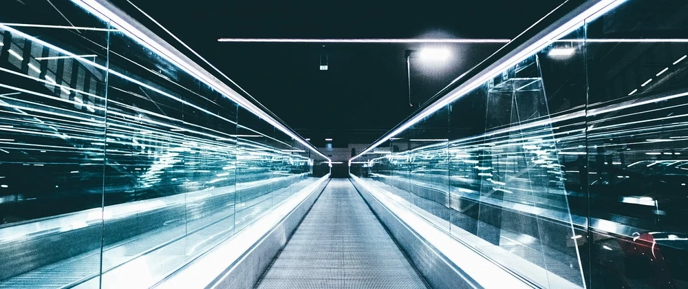 A walkway with darks and lights