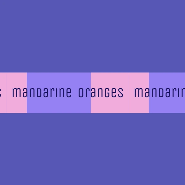 A dual color marquee (pink and purple) with the words oranges and mandarine repeating